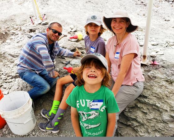 Family Posing at a Dino Dig