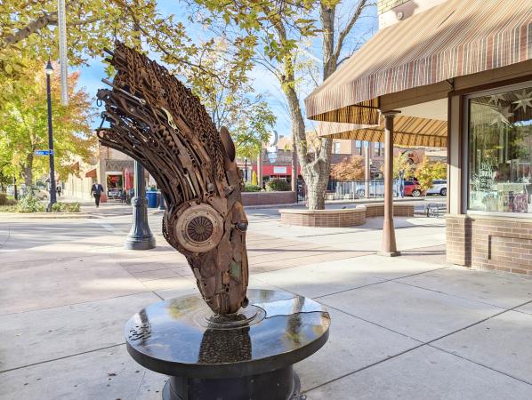 Sculpture in Downtown that is part of Art on the Corner - Jeff Bates' "Self Reflection"