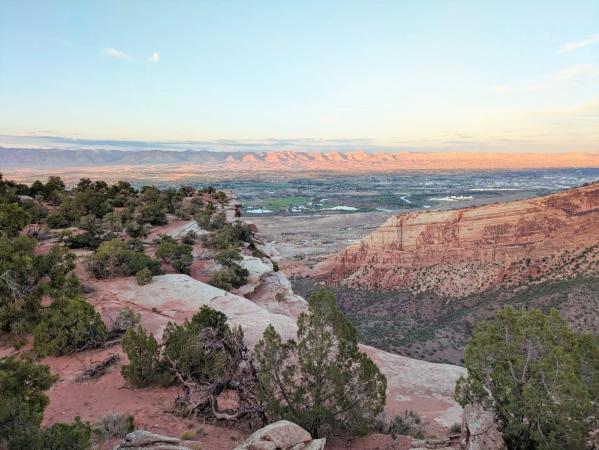View of Colorado National Monument with Book Cliffs in the Background