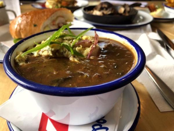 Mandeville's Hambone Restaurant serves a dark roux gumbo.