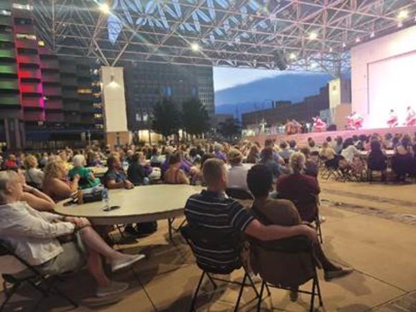 Attendees of Project SEARCH convention watch cultural performances on Civic Plaza.