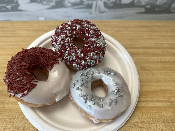 a trio of donuts on a plate