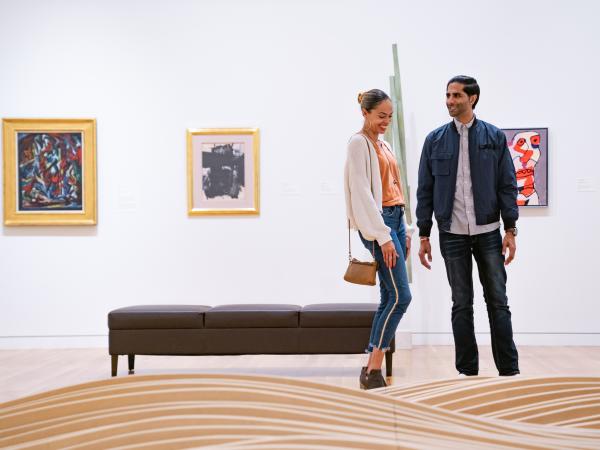 A couple exploring the Columbus Museum of Art.