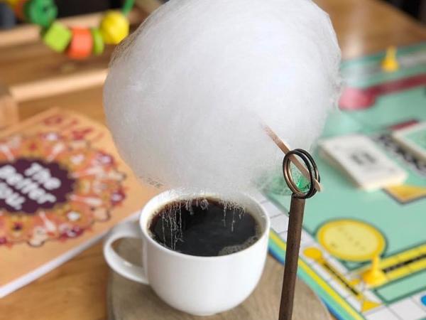 Rainy day coffee from Bottoms Up Coffee consists of cotton candy melting into a cup of coffee