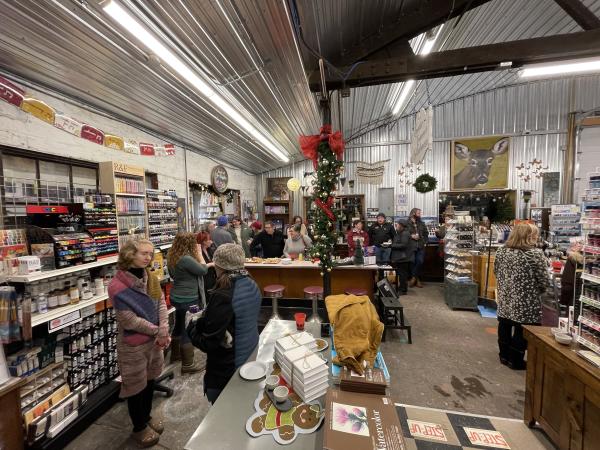 People gathering in a art supply store to network