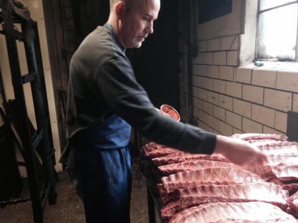 Butcher preparing ribs at Old Hoosier Meats in Elkhart County