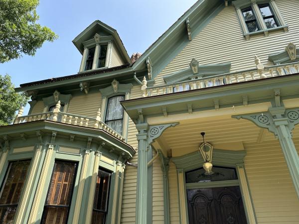 The ornate exterior of The Clayton House in Fort Smith, Arkansas, showcases details from the Victorian era.