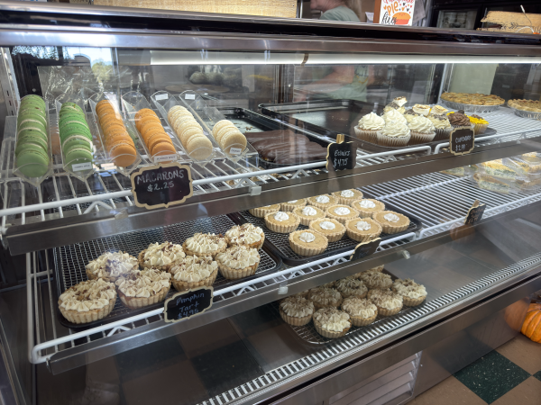 Seasonal pies, macaroons, and eclairs sit on display at Harvest Moon Bakery in Fort Smith, Arkansas.