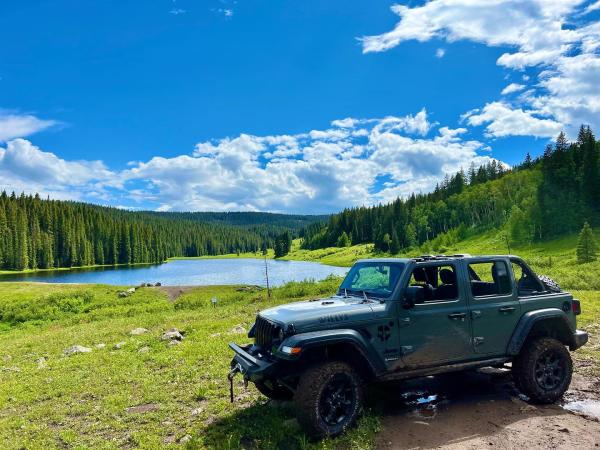 Picture of a Jeep Outside in Front of a Lake