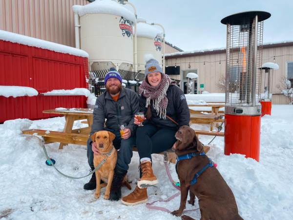 Couple with dogs at badgerstate brewing