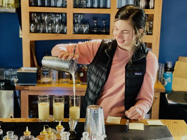 Payson Clark pouring drinks at Port Chilkoot Distillery