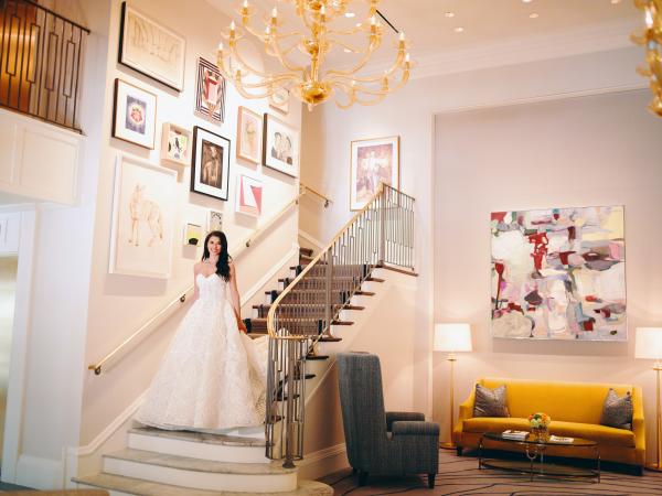 Bride Walking Down The Stairs At Lancaster In Houston, TX