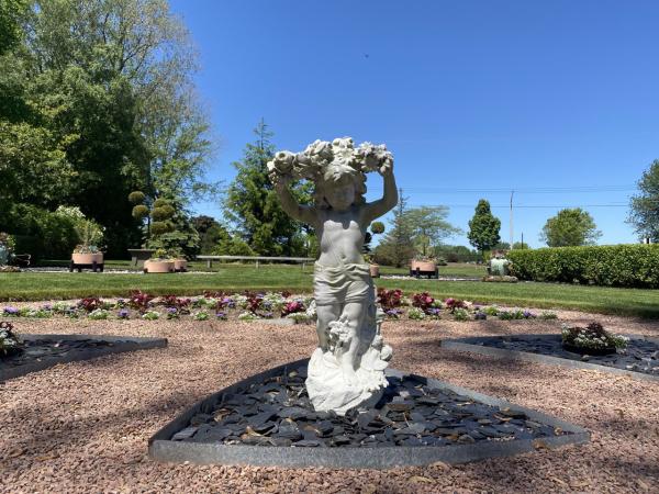 cherub sculpture at West of the Lake Gardens