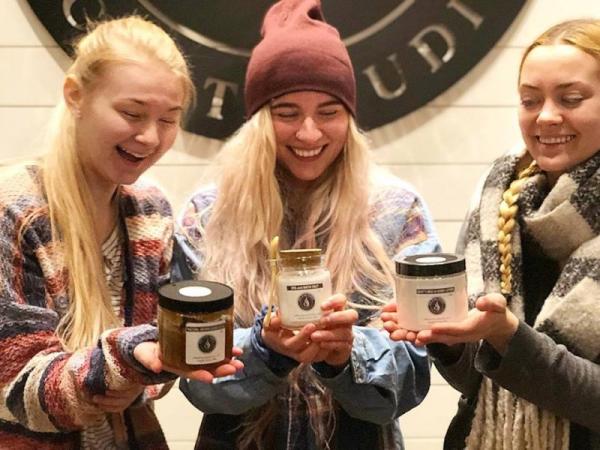 Girls holding their new candles