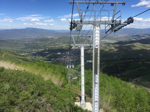view from chairlift with mountain scenic in background