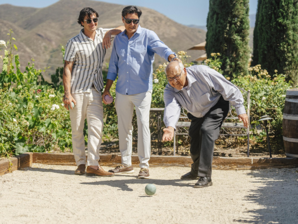 Father and Son Playing Bocce Ball at Winery