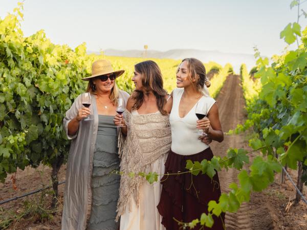 Women Walking in Vineyards