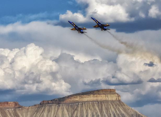 Blue Angels flying in front of Mount Garfield