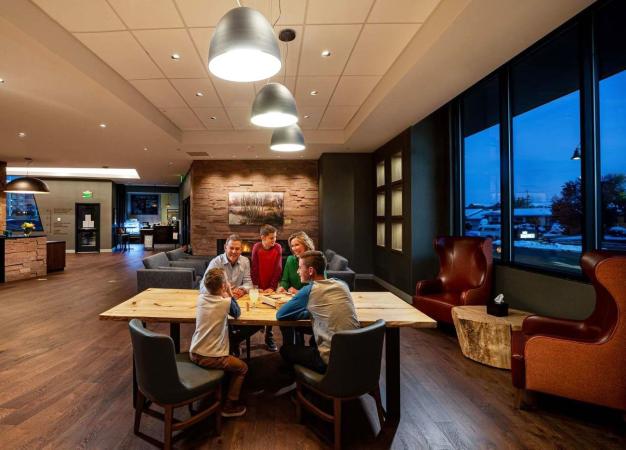 View of a family in Hotel Maverick's Lobby