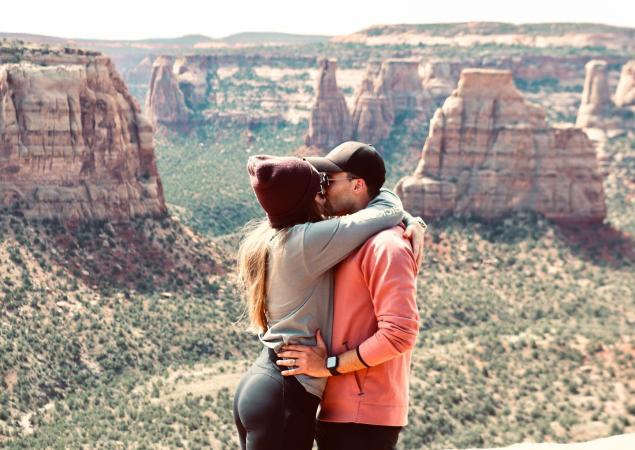 A Couple Kissing in front of Colorado National Monument