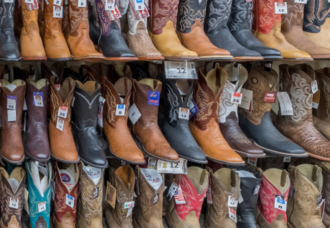 Cowboy boots adorn shelves, at a popular western wear shop in Casper, WY.
