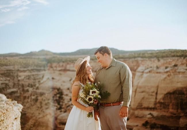 Recently Married Couple Posing on Colorado National Monuement