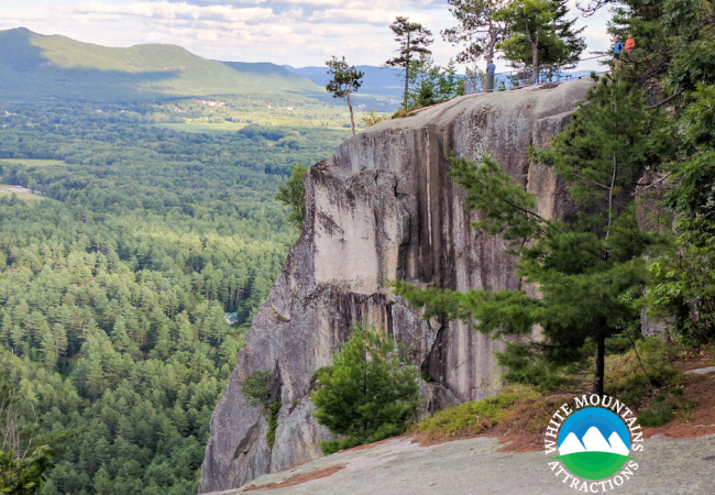 A view of Cathedral Ledge, a large rock outcropping overlooking a lush green forest