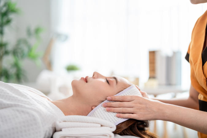 Person Getting a Facial at a Spa