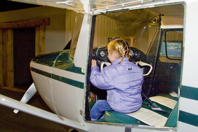 Girl in a Model Jet at Museum of the West