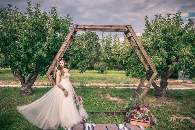 Woman standing at altar at Cross Orchards