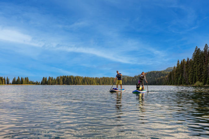 People on Paddleboards on a Lake on the Grand Mesa