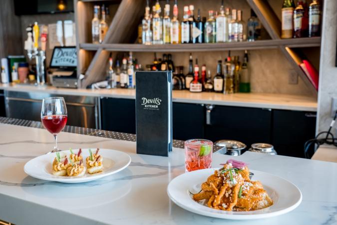 Two Plates of Food at the Bar at Devil's Kitchen