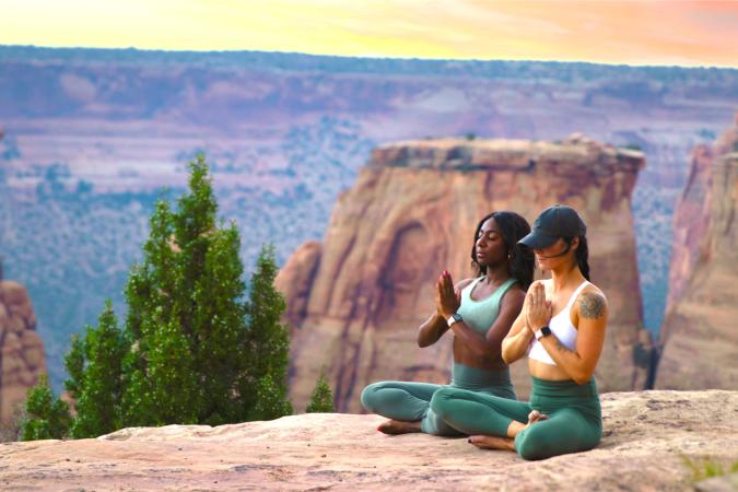 Two Women Doing Yoga on The Colorado National Monument