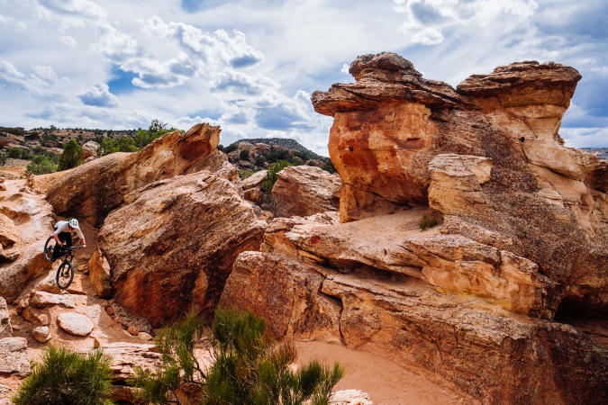 Person mountain biking in the Colorado National Monument