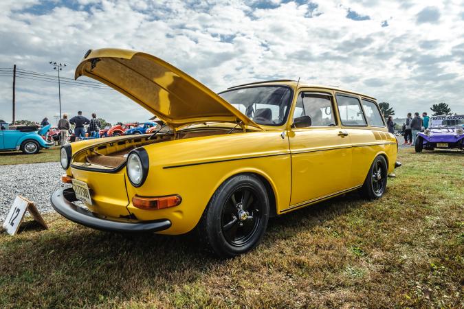 Yellow vintage VW station wagon at Maple Grove Raceway