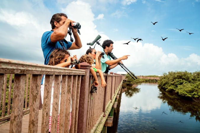 Family enjoying birdwatching at the South Padre Island Birding Center