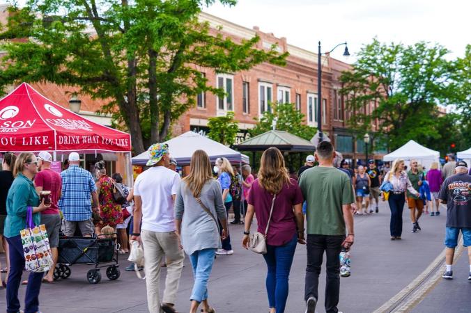 People walking around Market on Main in Downtown Grand Junction