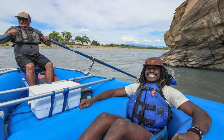 Man Posing on Raft on the River