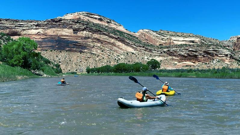 a group of people rafting on the Colorado River