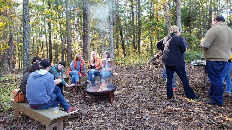 People Sitting at Campfire at ACME's Salt and Smoke Festival