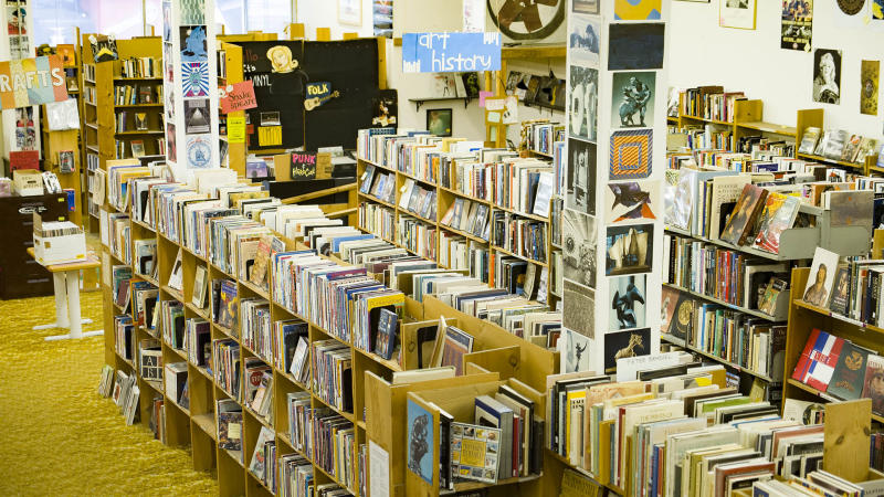 Shelves filled with books and records