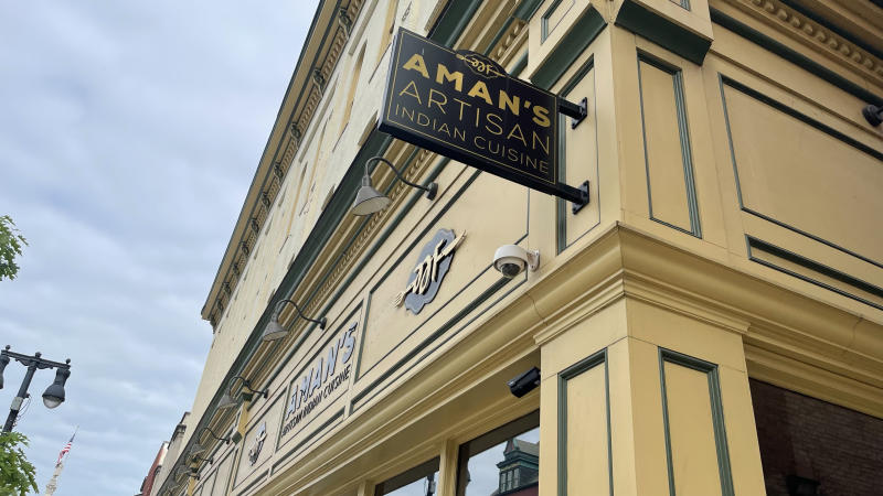 The exterior sign at Aman's Artisan Indian Cuisine in Easton, Pa.