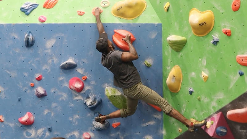 Man climbing at Grand Valley Climbing Gym