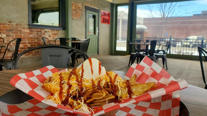 Try the loaded fries with pulled pork, cheese and BBQ sauce at Gather Around BBQ in Maritinsville.