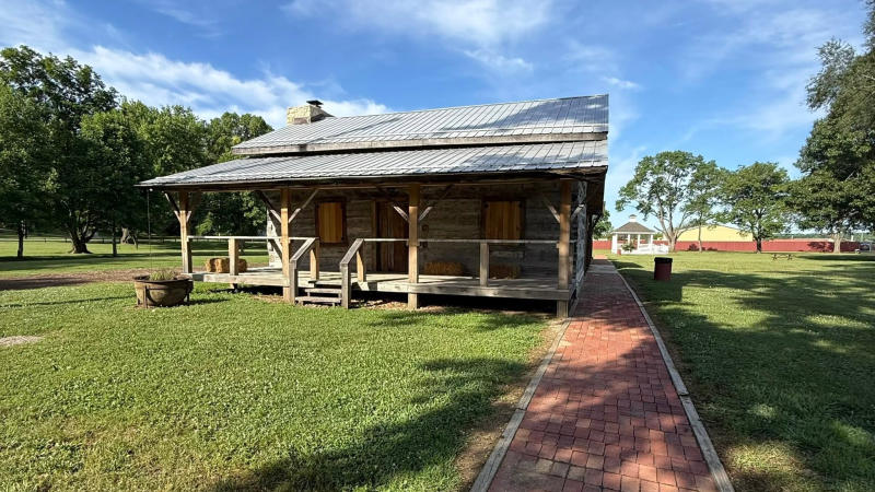 The log cabin at Waverly Park stands at the end of a brick paved walkway, near the modern restrooms. The cabin was constructed from period-accurate materials salvaged from other cabins in the region, and now is an integral part of the Old Town Waverly Park Festival in late September.