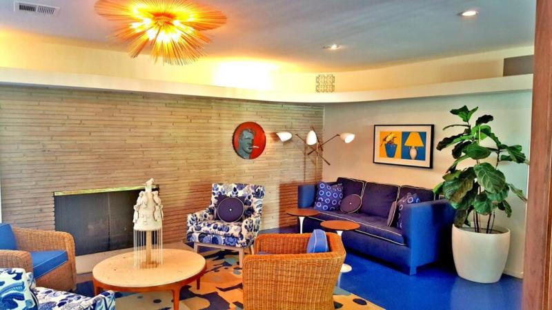 Holiday House Palm Springs living area with curated artwork