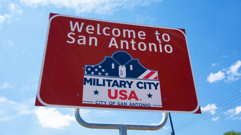 Road sign saying "Welcome to San Antonio. Military City, USA"