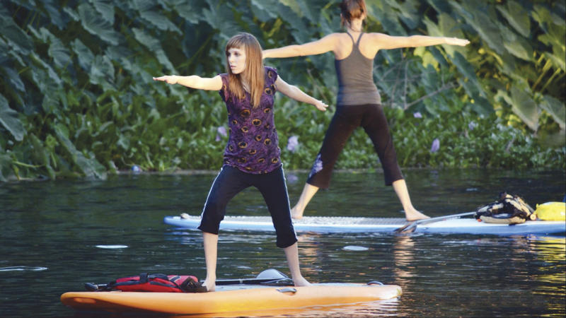 Yoga on stand-up paddle boards