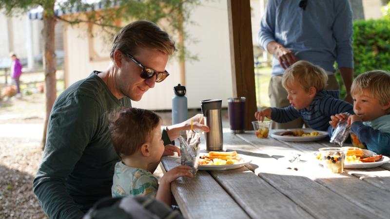 Father dines with his sons at Elmwood Park Zoo