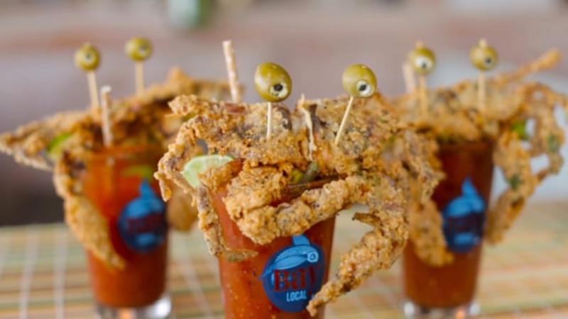 Bloody Mary drink topped with a Soft Shell Blue Crab at Bay Local Eatery in Virginia Beach